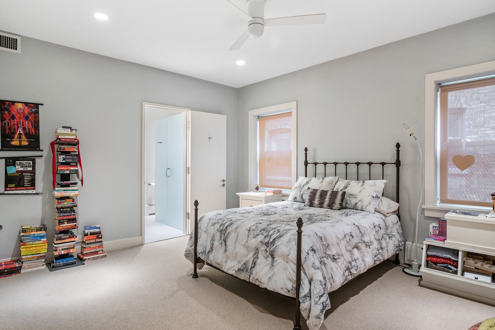 710 West Junior Terrace, Unit 2 Chicago, IL 60613 - Photo 18 of 37 a bedroom with a bed and a couch