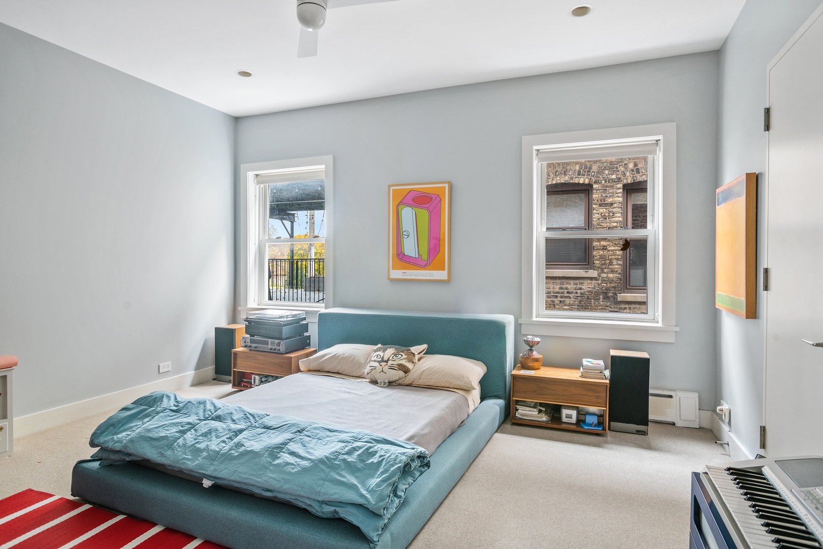 710 West Junior Terrace, Unit 2 Chicago, IL 60613 - Photo 22 of 37 a bedroom with a bed and dresser