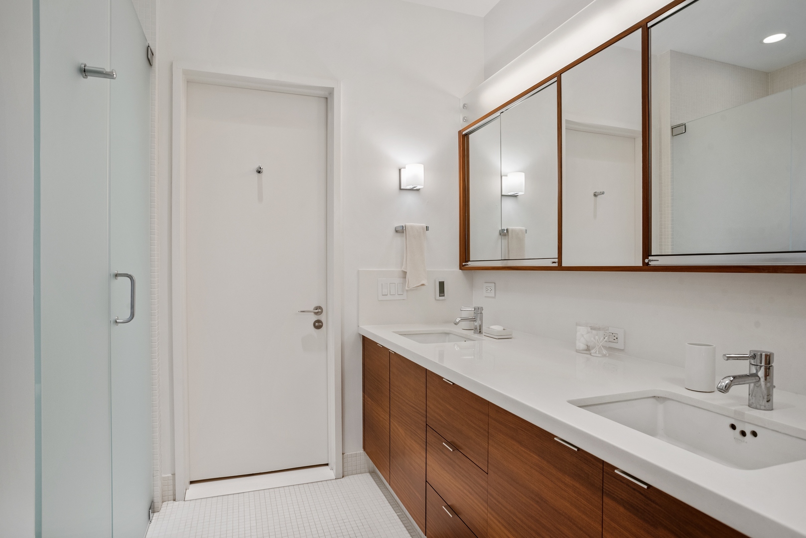 710 West Junior Terrace, Unit 2 Chicago, IL 60613 - Photo 23 of 37 a bathroom with a double vanity sink mirror and