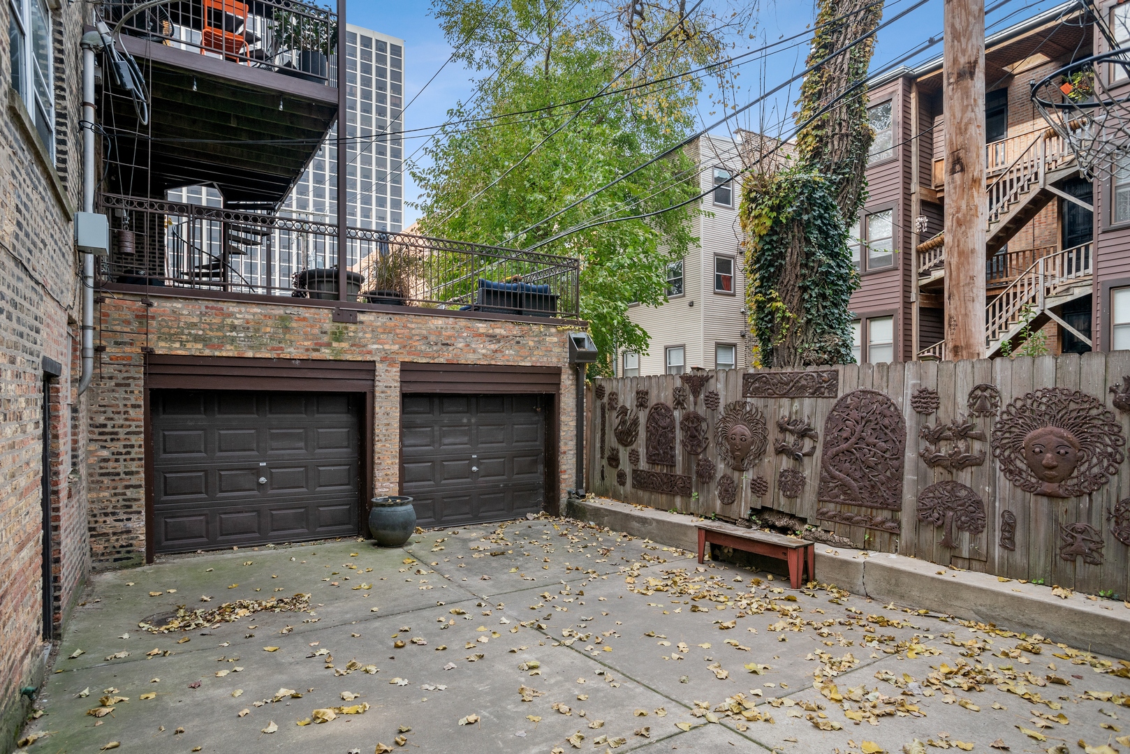 710 West Junior Terrace, Unit 2 Chicago, IL 60613 - Photo 26 of 37 front view of a house with a yard and seating space