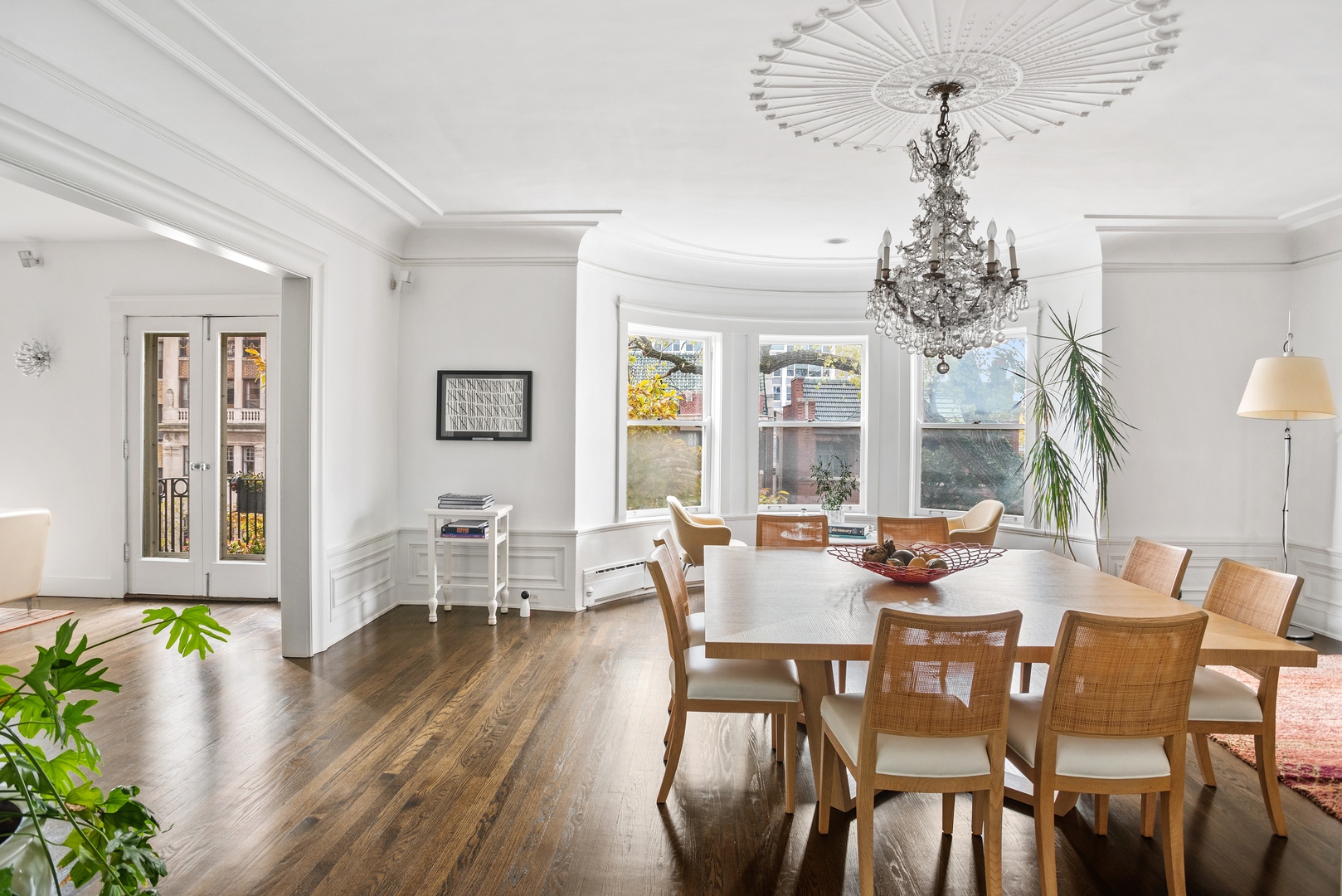 710 West Junior Terrace, Unit 2 Chicago, IL 60613 - Photo 8 of 37 a view of a dining room with furniture window and wooden floor