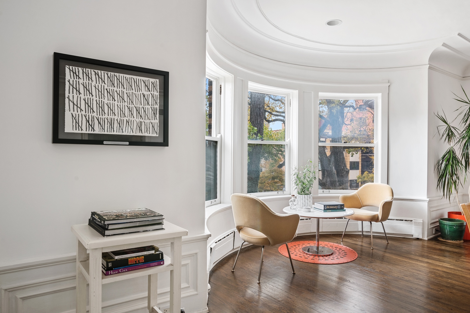 710 West Junior Terrace, Unit 2 Chicago, IL 60613 - Photo 10 of 37 a living room with furniture a rug and a large window