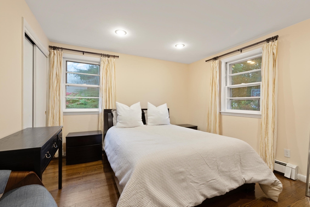 33 Longmeadow Lane Sharon, MA 02067 - Photo 14 of 29 a bedroom with a bed and a window