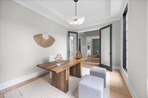 a bathroom with a toilet sink and shower