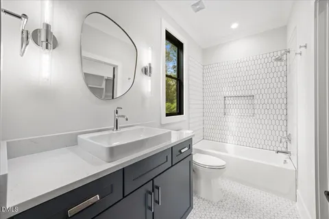 a bed room with a bed and a large window