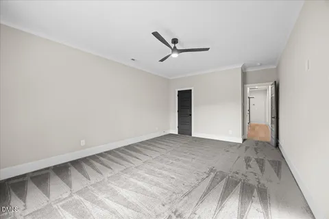 a front view of a house with a yard table and chairs