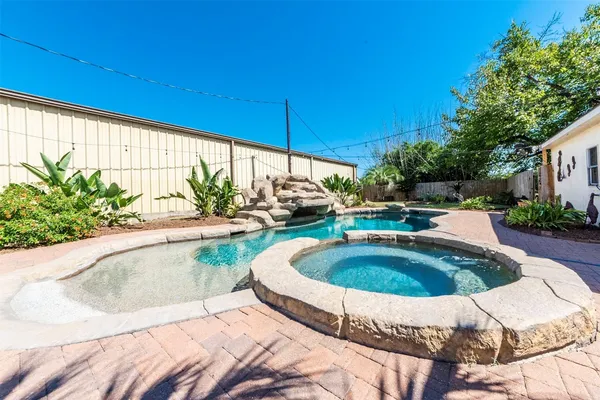 a view of outdoor space yard swimming pool and outdoor seating