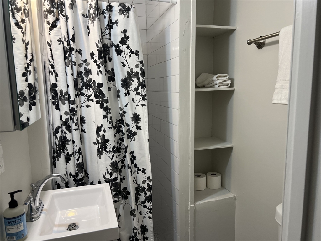 35 Grove Street, Unit 3 Boston, MA 02114 - Photo 12 of 20 wooden floor