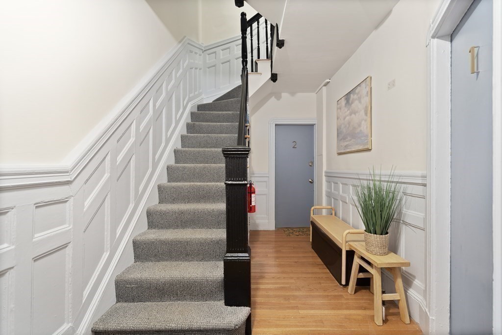 35 Grove Street, Unit 3 Boston, MA 02114 - Photo 19 of 20 a view of entryway and hall with wooden floor