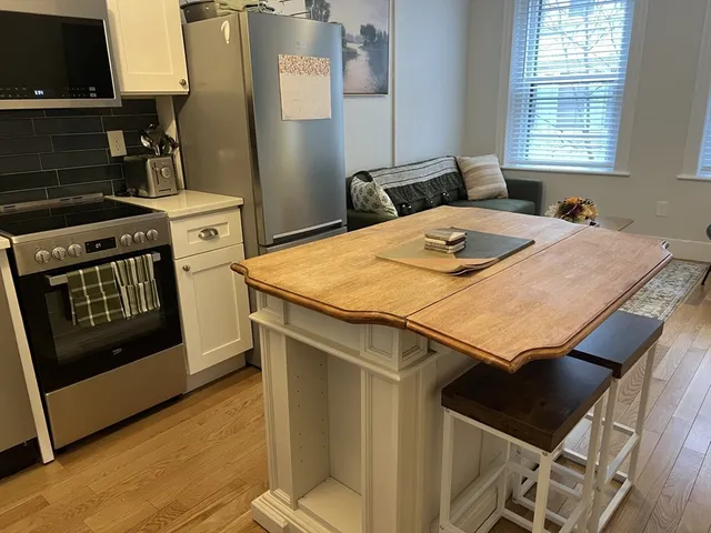 a utility room with washer and dryer
