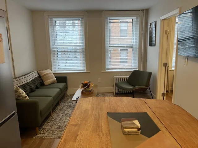 a living room with furniture and a couch