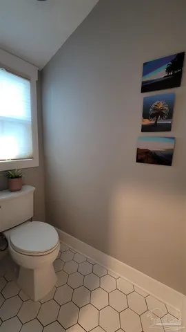 a bathroom with a toilet