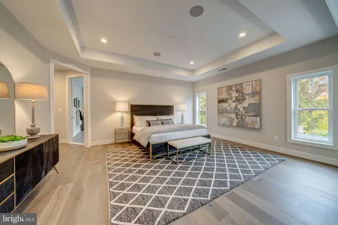 a bedroom with bed and furniture