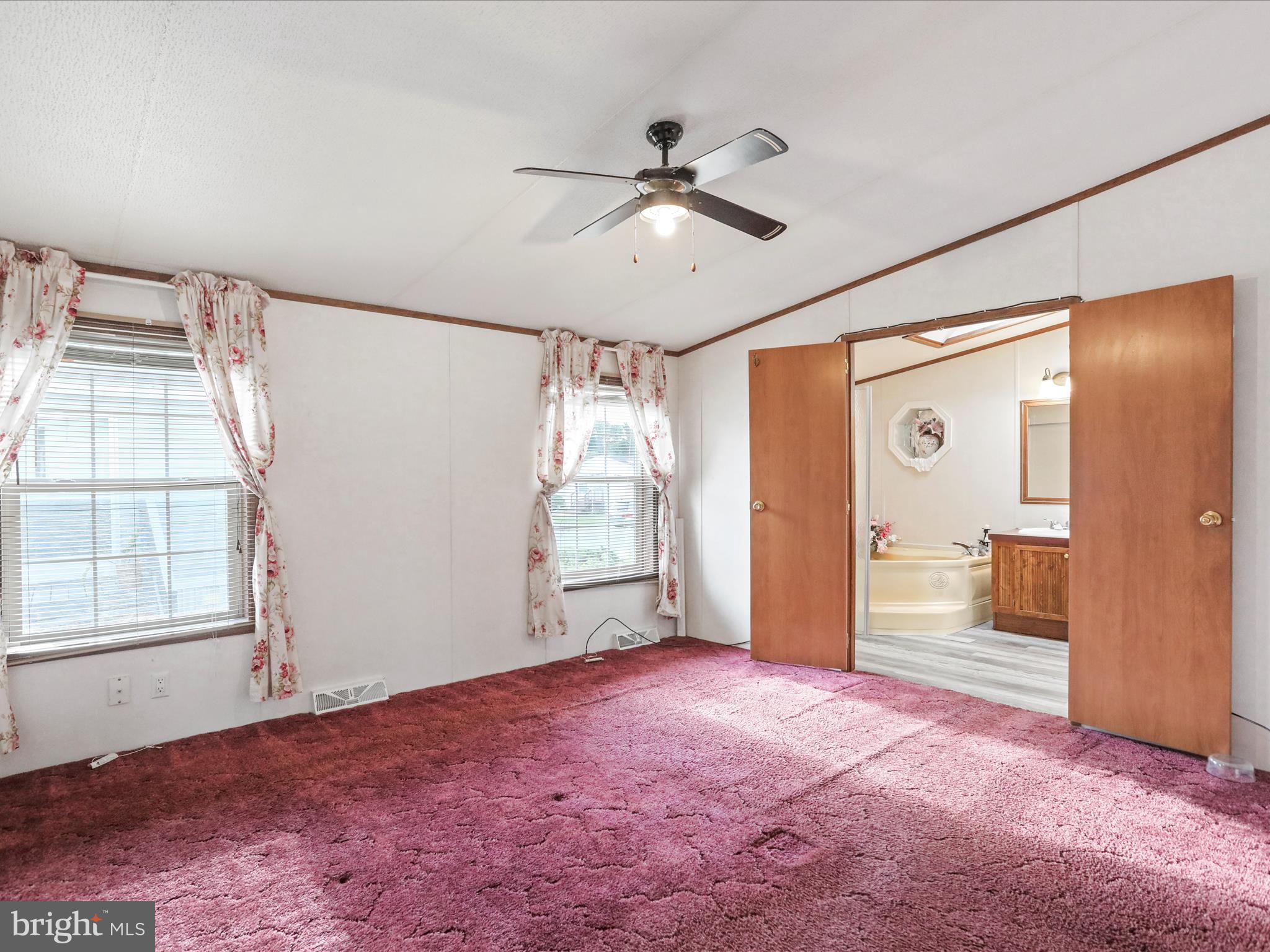 16810 Alcott Road Hagerstown, MD 21740 - Photo 19 of 34 a view of empty room with wooden floor and fan
