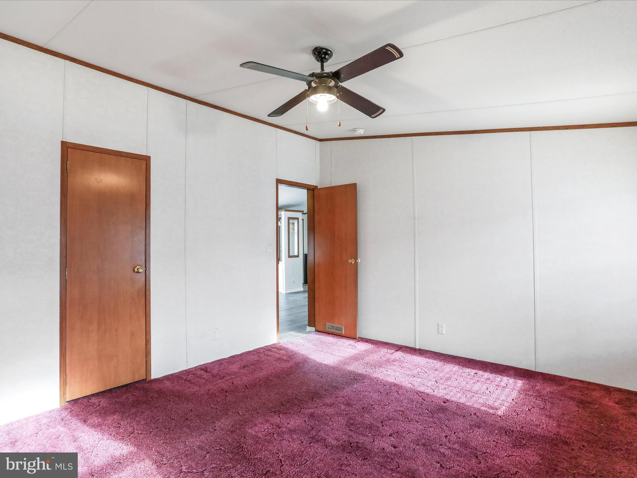 16810 Alcott Road Hagerstown, MD 21740 - Photo 20 of 34 a view of a livingroom with a ceiling fan