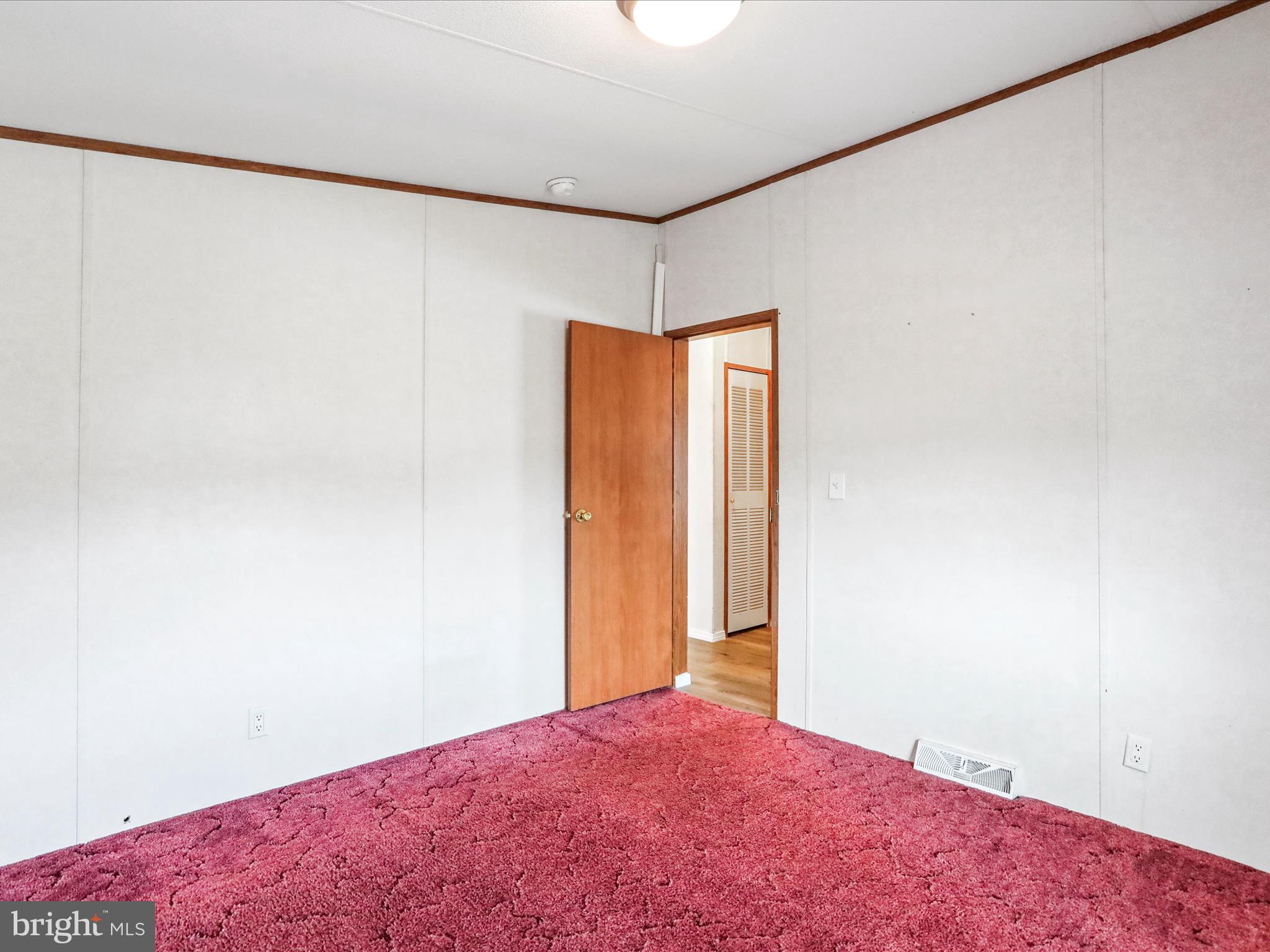 16810 Alcott Road Hagerstown, MD 21740 - Photo 26 of 34 a view of a big room with closet and a bed