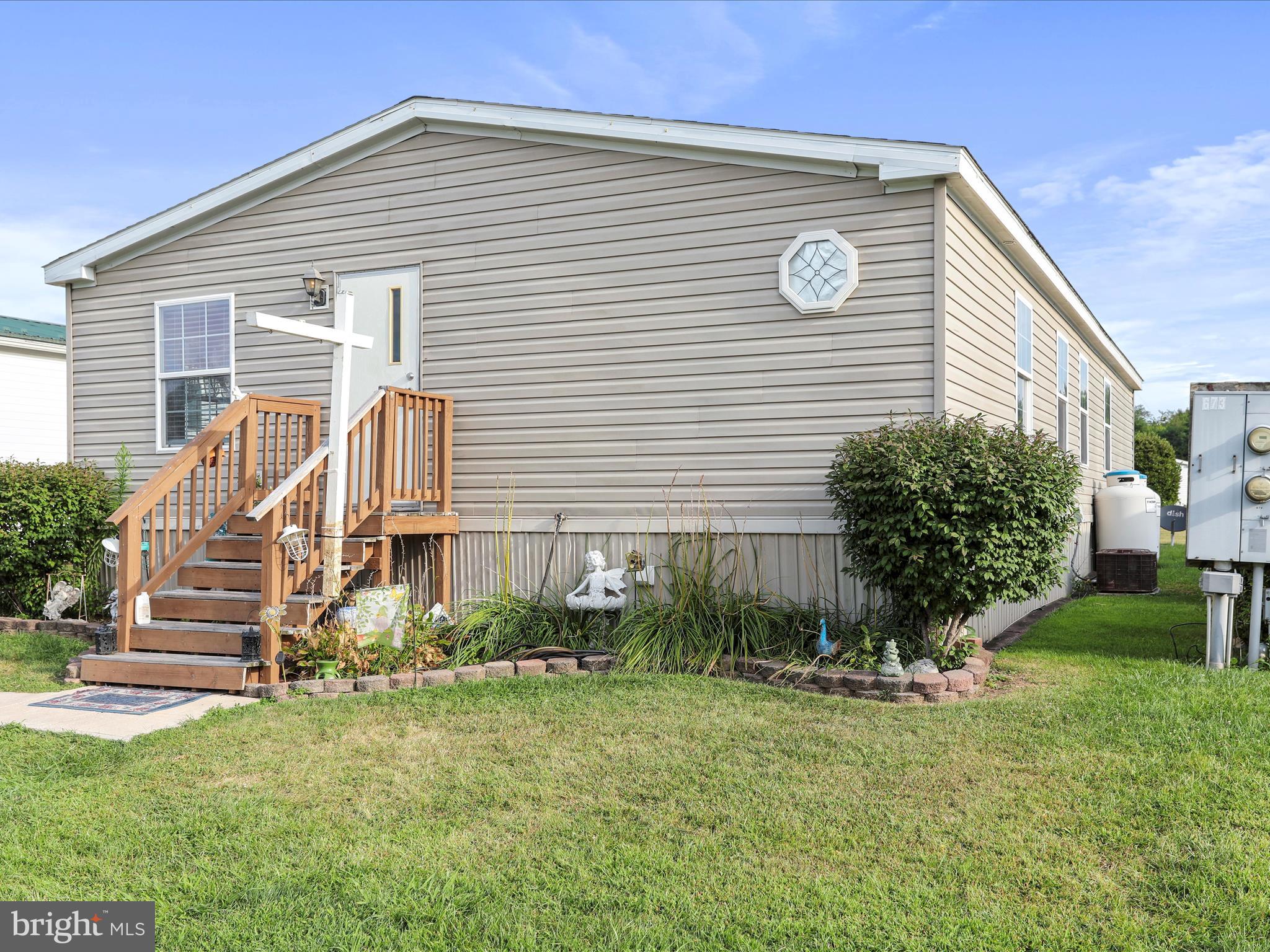 16810 Alcott Road Hagerstown, MD 21740 - Photo 3 of 34 a front view of house with yard