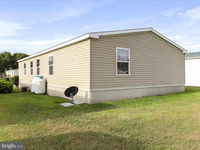 a view of a backyard with a garden