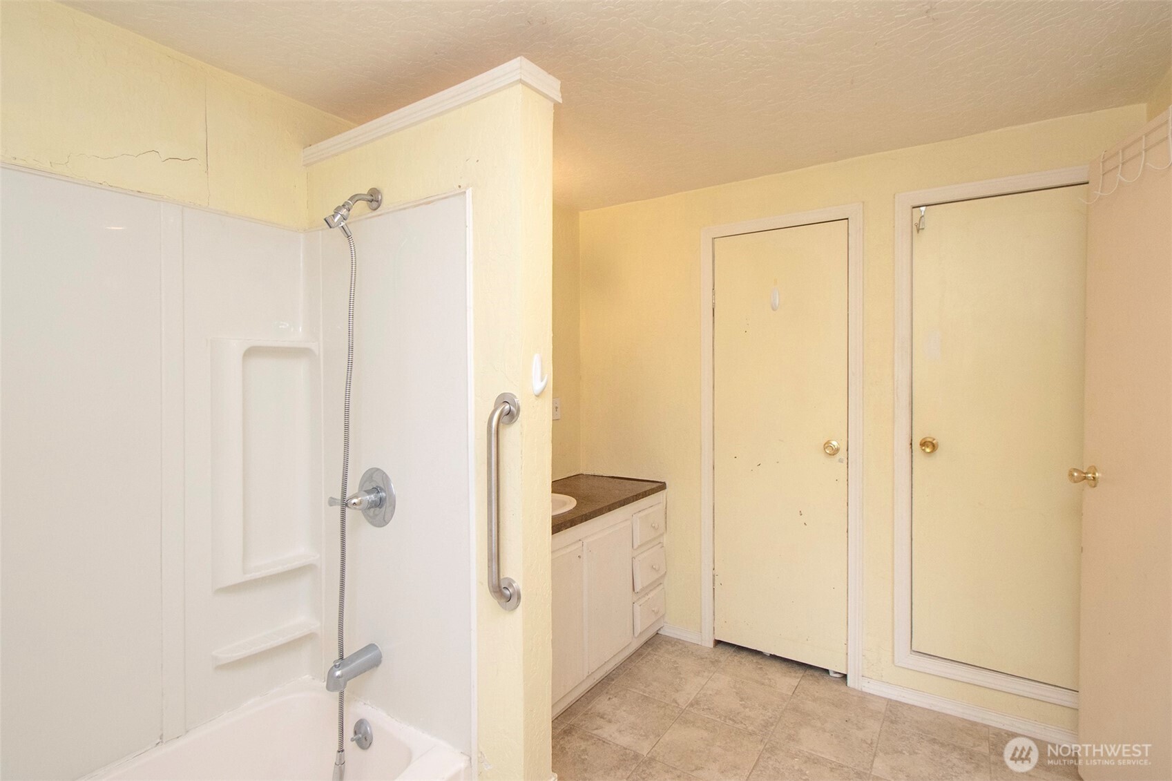 90 Baywood Village Road, Unit 34 Sequim, WA 98382 - Photo 31 of 40 a bathroom with a shower and a glass door