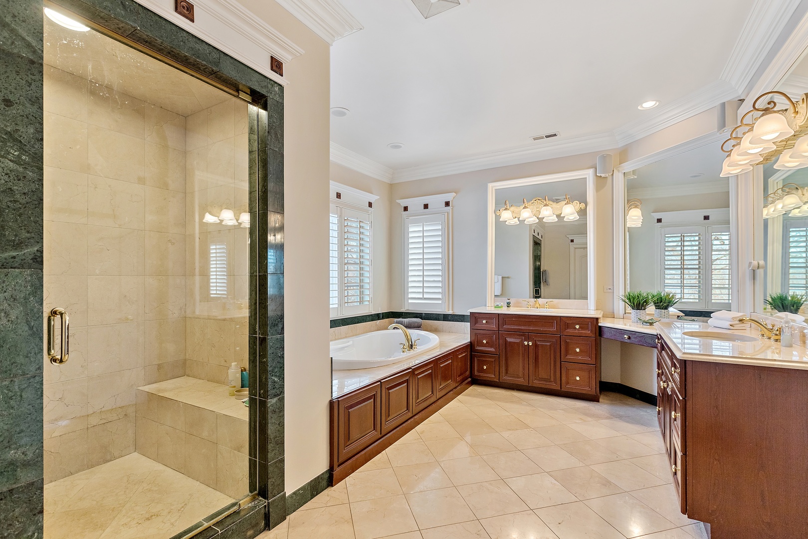 425 Sunset Ridge Road Northfield, IL 60093 - Photo 16 of 53 a spacious bathroom with a tub sink shower and mirror