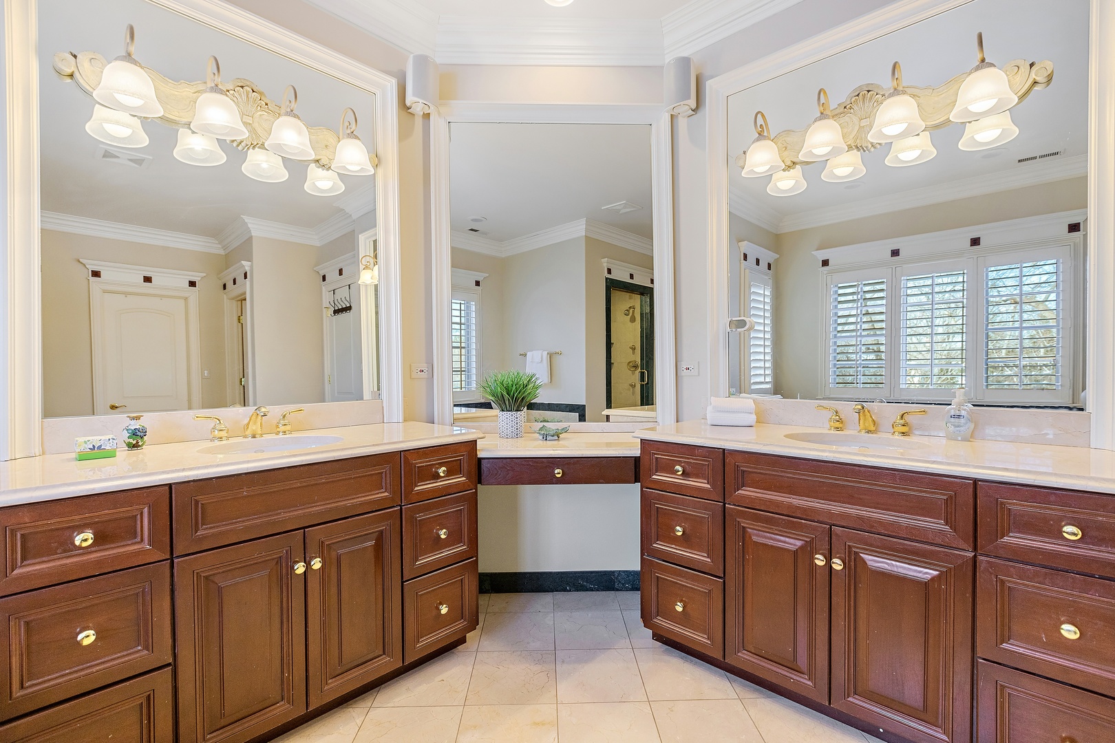 425 Sunset Ridge Road Northfield, IL 60093 - Photo 17 of 53 a spacious bathroom with a granite countertop double vanity and a large mirror