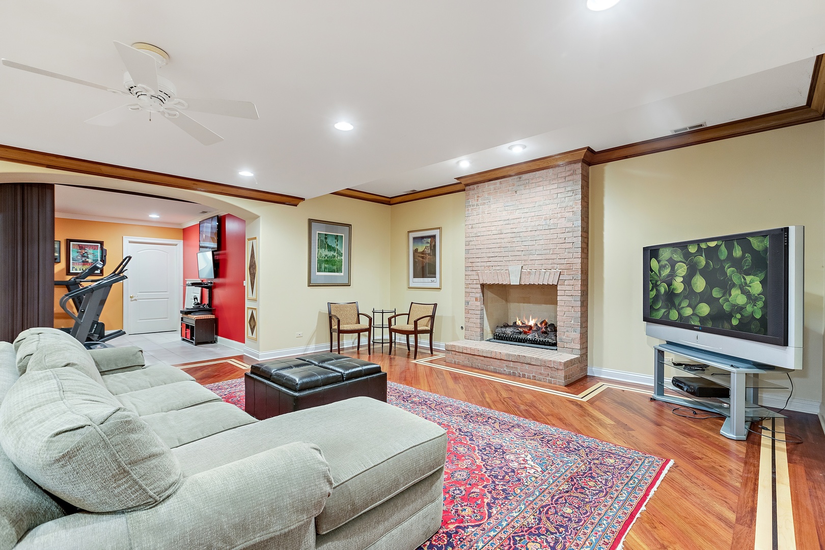 425 Sunset Ridge Road Northfield, IL 60093 - Photo 25 of 53 a living room with furniture and a flat screen tv