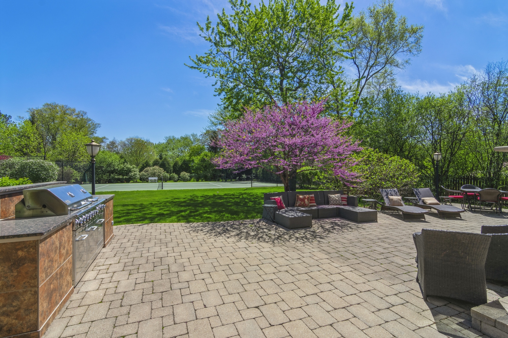 425 Sunset Ridge Road Northfield, IL 60093 - Photo 30 of 53 a view of a backyard with sitting area
