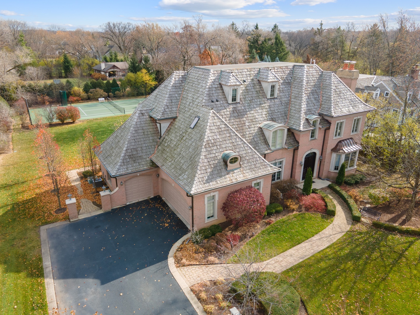 425 Sunset Ridge Road Northfield, IL 60093 - Photo 47 of 53 an aerial view of a house with a garden and lake view