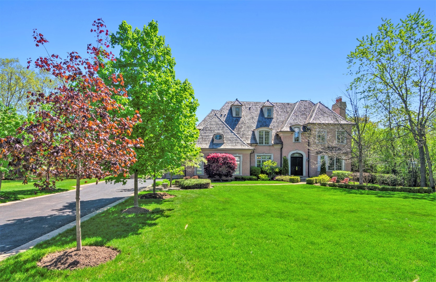 425 Sunset Ridge Road Northfield, IL 60093 - Photo 49 of 53 a front view of house with yard
