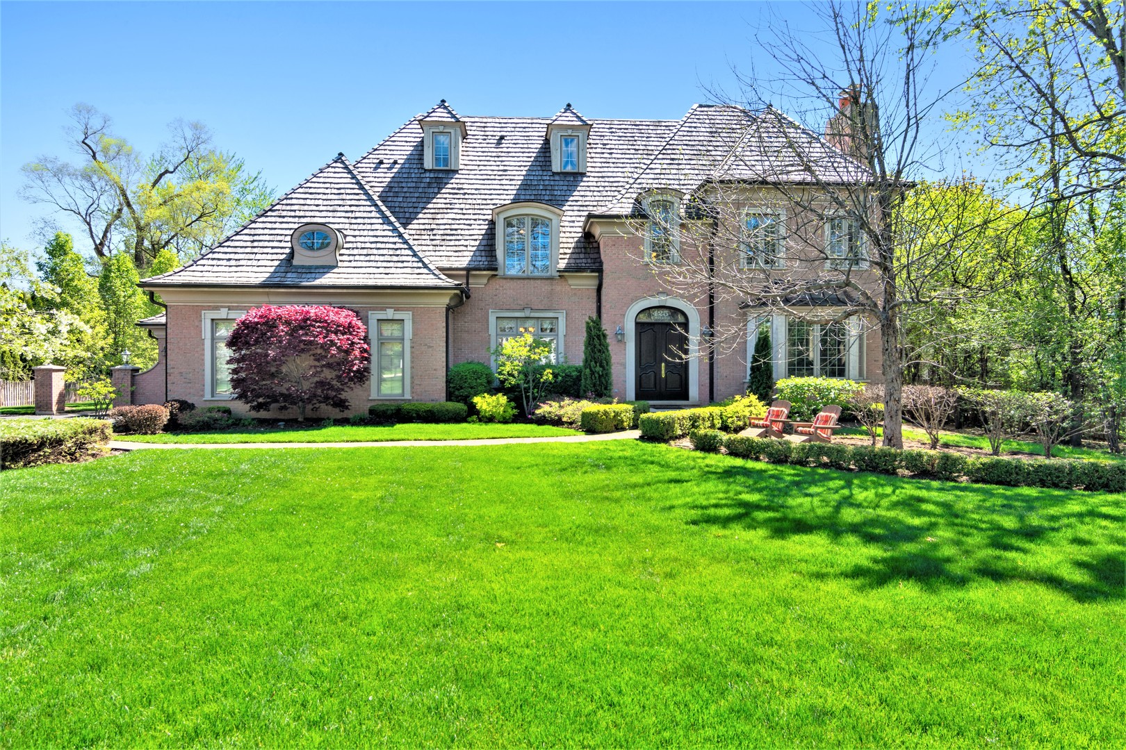 425 Sunset Ridge Road Northfield, IL 60093 - Photo 50 of 53 a front view of a house with garden