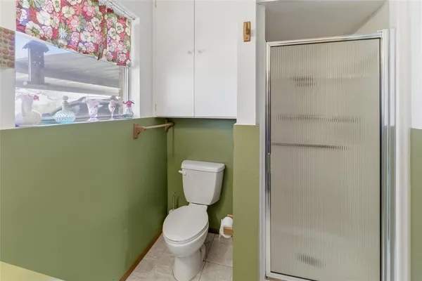 a bathroom with a toilet and a sink