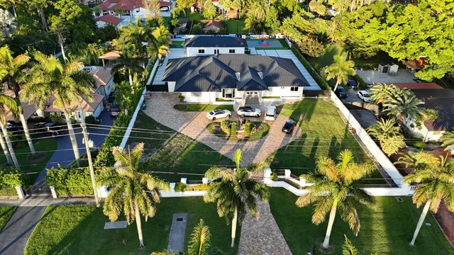 a view of swimming pool with a patio