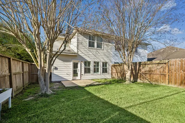 a view of a backyard with a garden