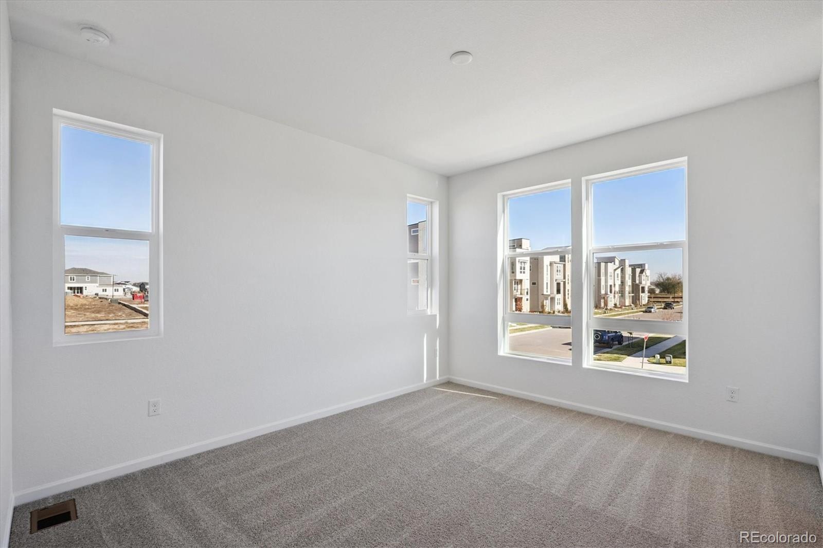 2870 Taryn Street Erie, CO 80026 - Photo 16 of 21 a view of an empty room with a window