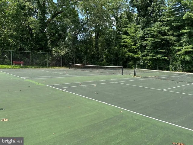 a view of a backyard with sitting area