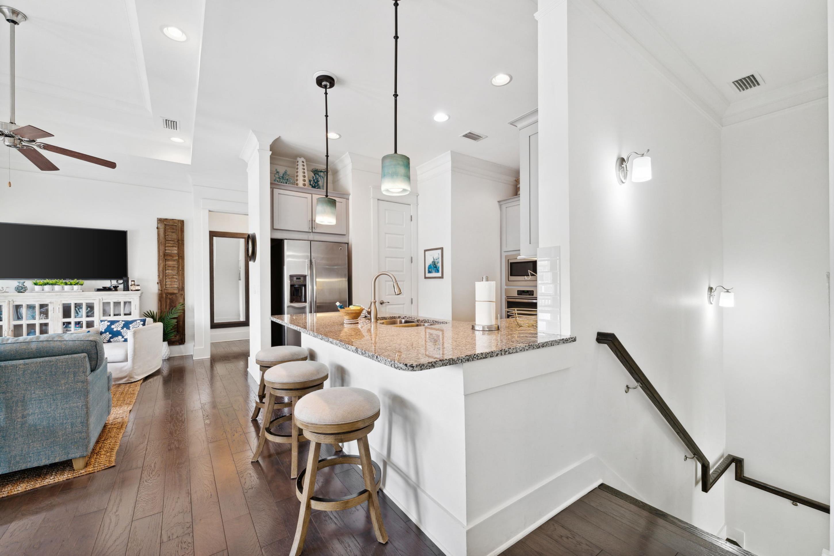 57 Milestone Dr Inlet Beach, Unit C Inlet Beach, FL 32461 - Photo 11 of 35 a living room with furniture and flat screen tv