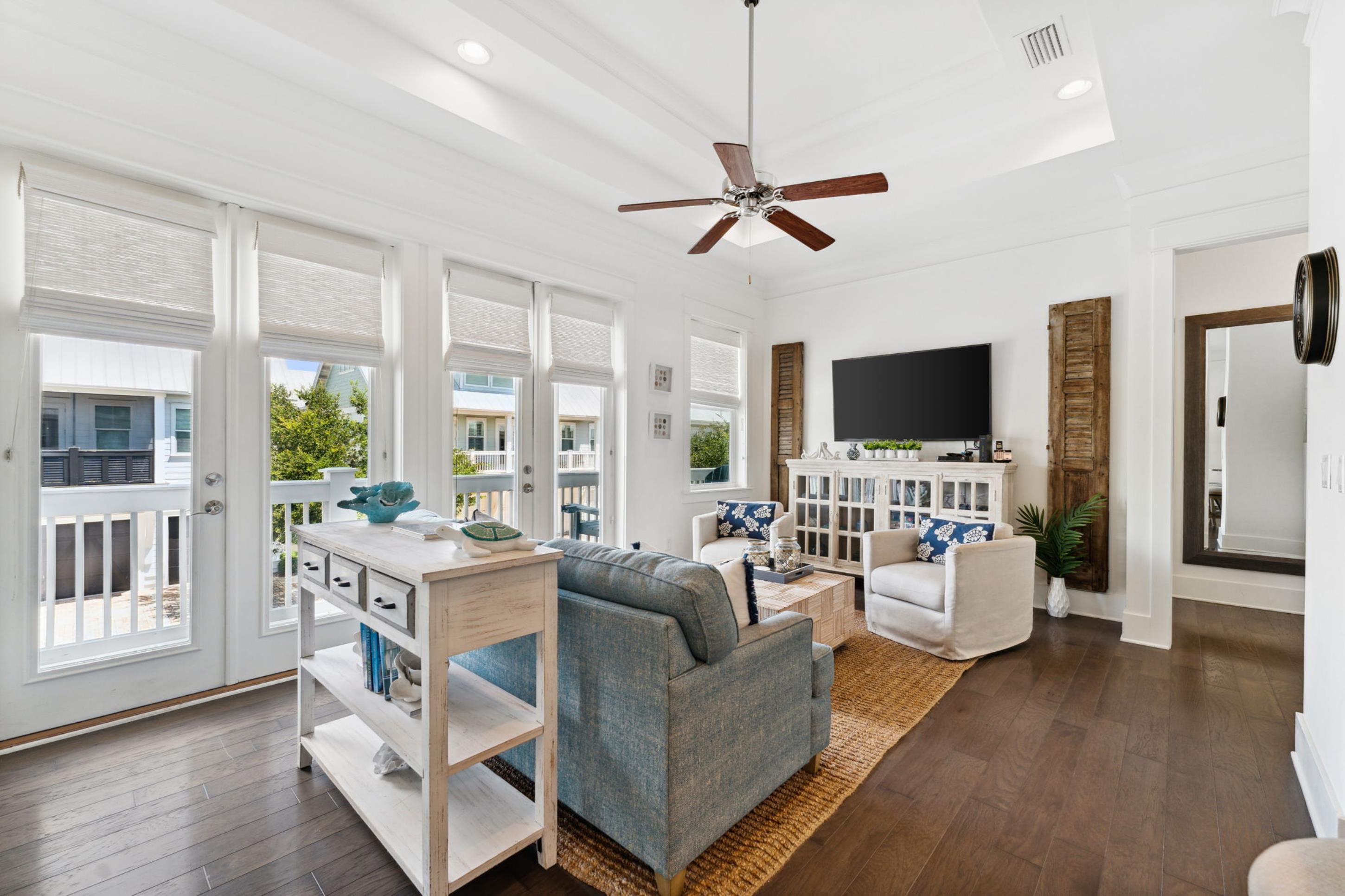 57 Milestone Dr Inlet Beach, Unit C Inlet Beach, FL 32461 - Photo 15 of 35 a living room with furniture and a flat screen tv