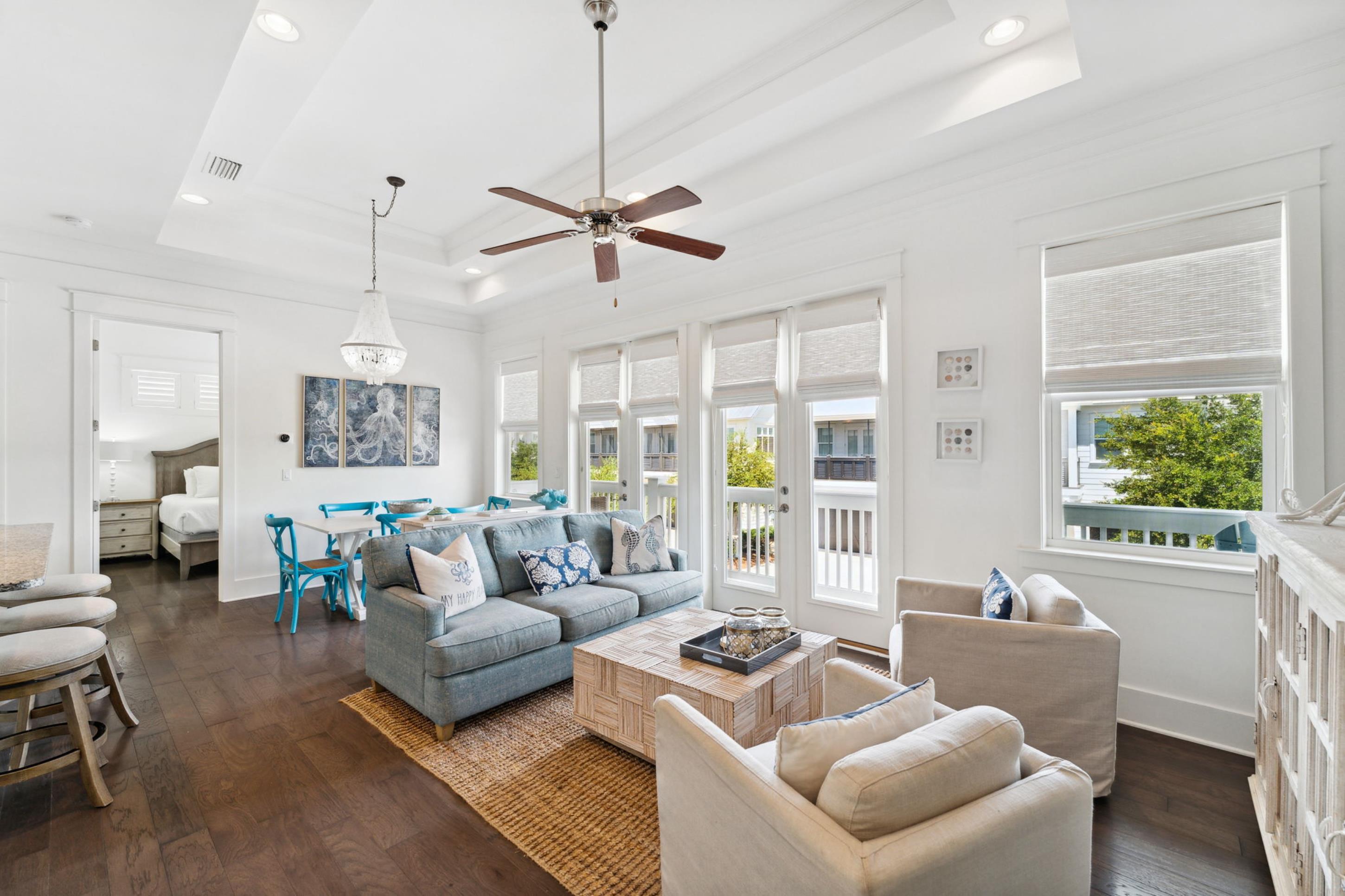 57 Milestone Dr Inlet Beach, Unit C Inlet Beach, FL 32461 - Photo 17 of 35 a living room with furniture and a large window