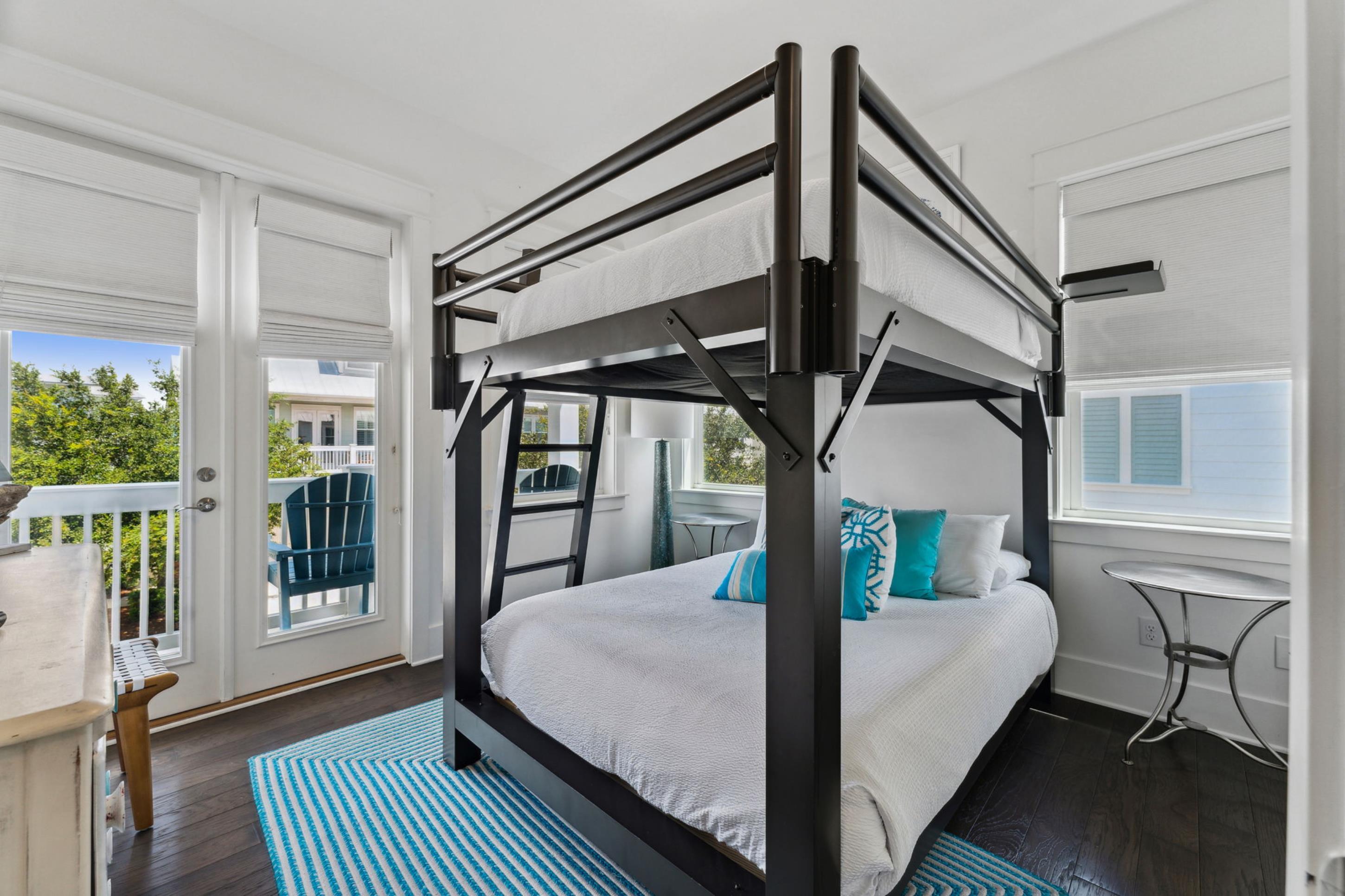 57 Milestone Dr Inlet Beach, Unit C Inlet Beach, FL 32461 - Photo 20 of 35 a bed room with a bed and a window