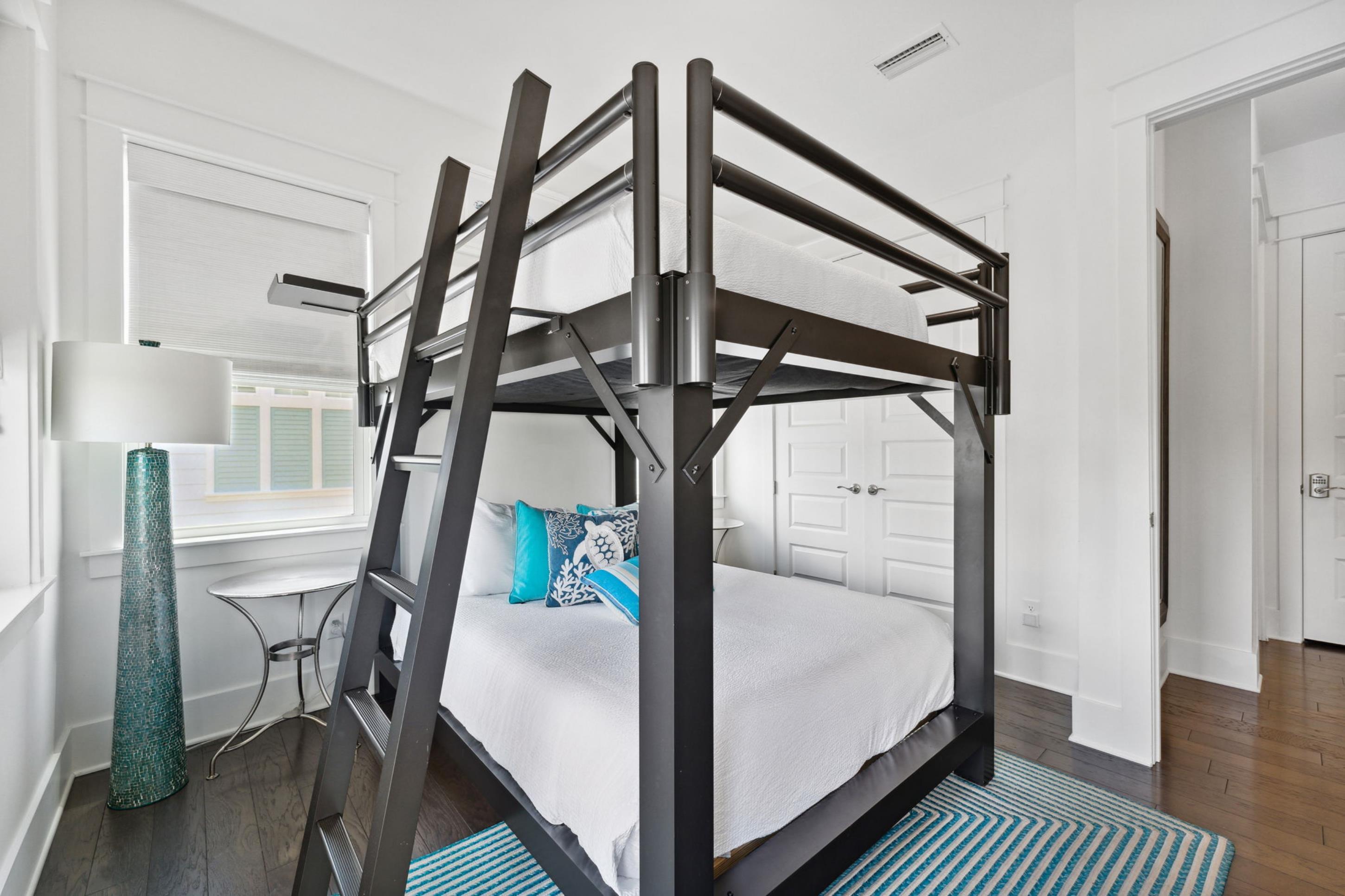 57 Milestone Dr Inlet Beach, Unit C Inlet Beach, FL 32461 - Photo 21 of 35 a bed room with a bed and a window