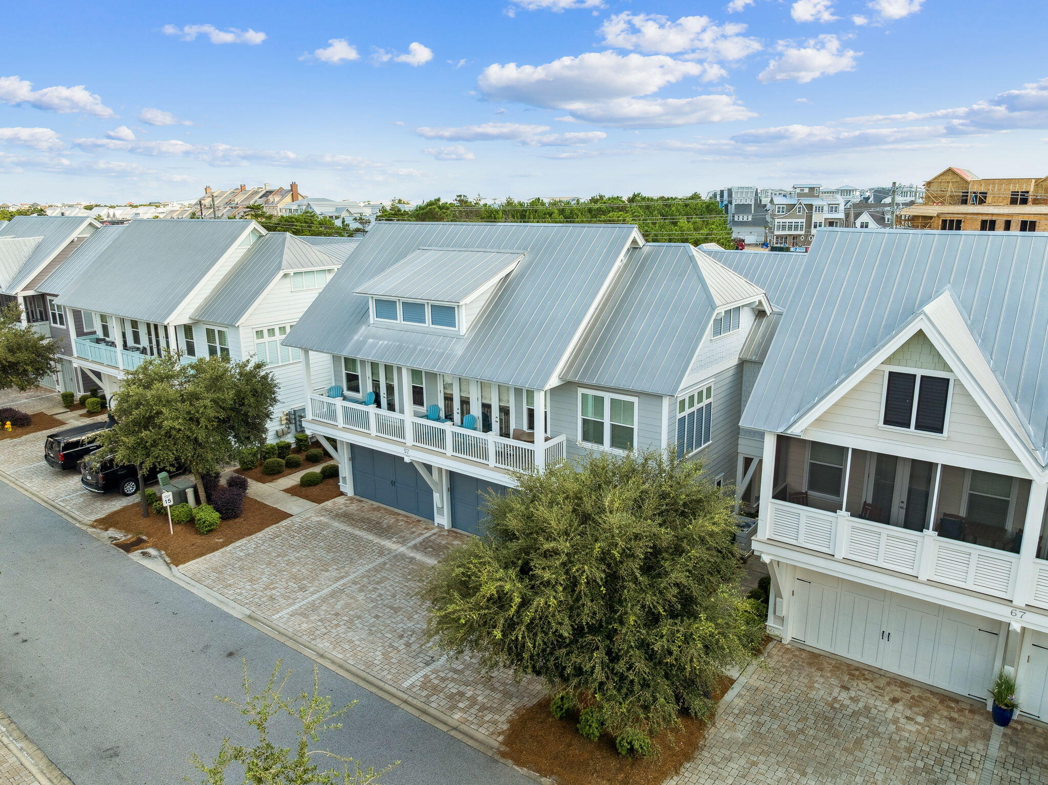57 Milestone Dr Inlet Beach, Unit C Inlet Beach, FL 32461 - Photo 28 of 35 an aerial view of a house with a yard