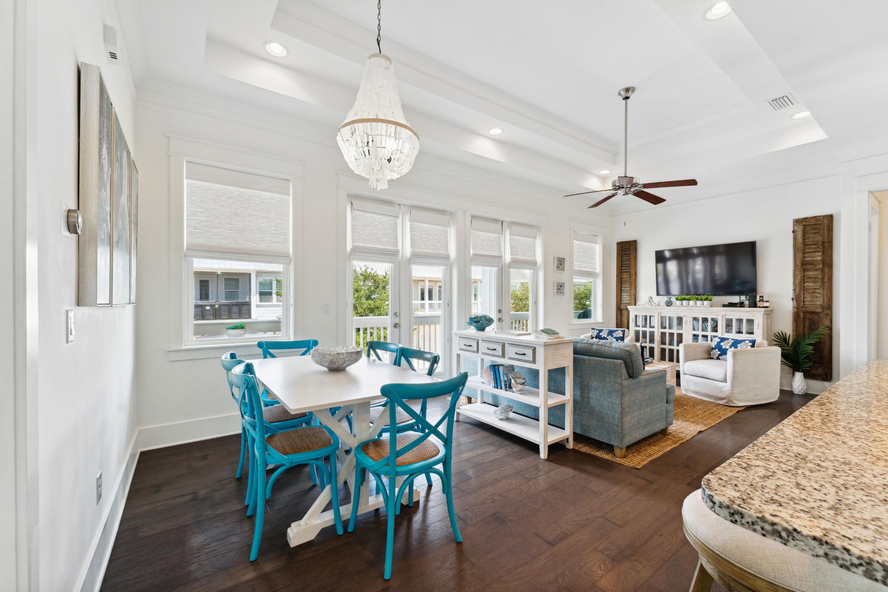57 Milestone Dr Inlet Beach, Unit C Inlet Beach, FL 32461 - Photo 4 of 35 a view of a dining room with furniture window and wooden floor