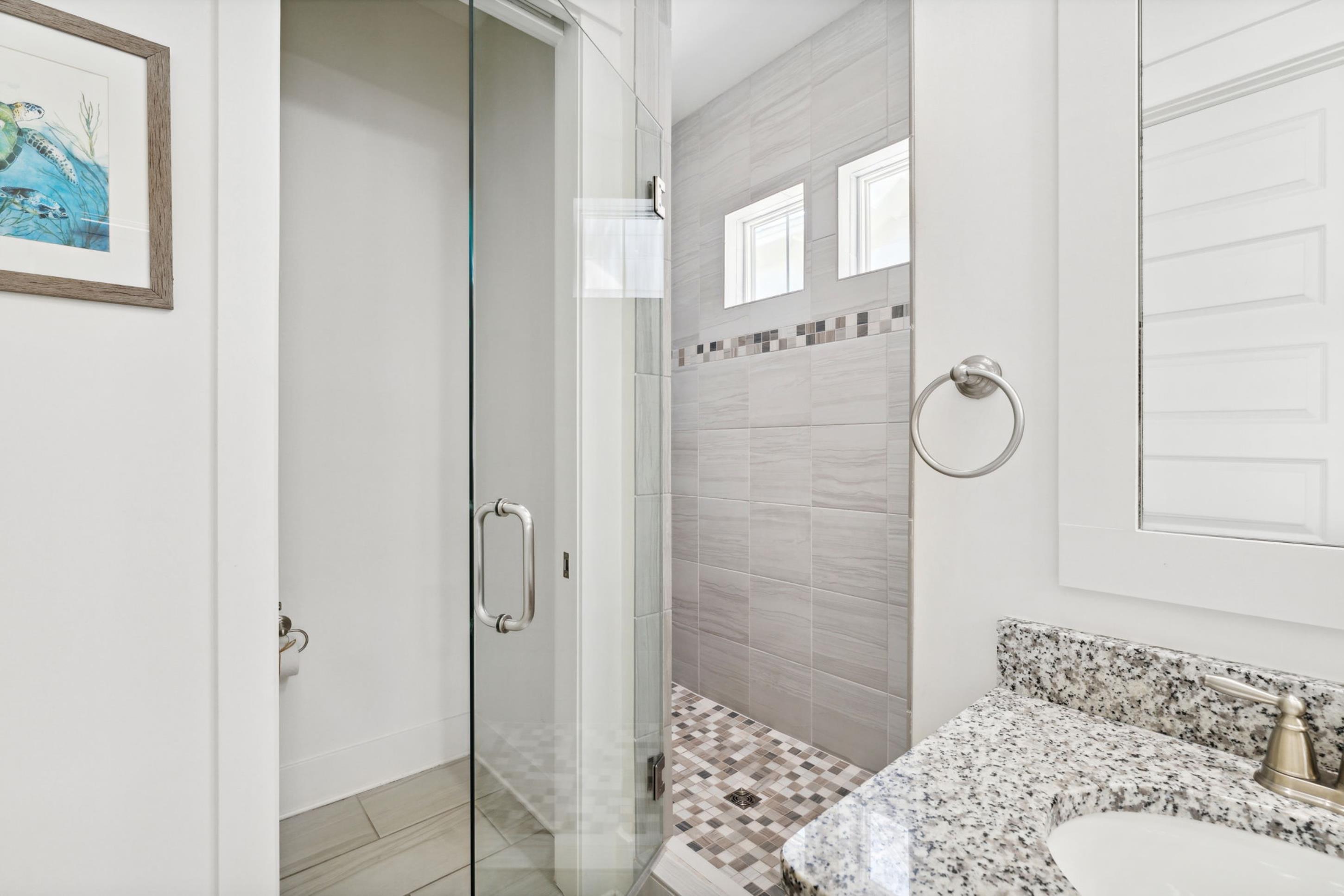 57 Milestone Dr Inlet Beach, Unit C Inlet Beach, FL 32461 - Photo 10 of 35 a bathroom with a shower and a sink