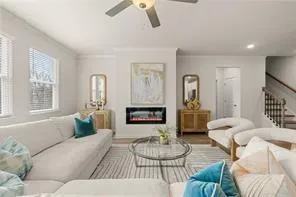 a kitchen with stainless steel appliances granite countertop a white cabinets and wooden floor