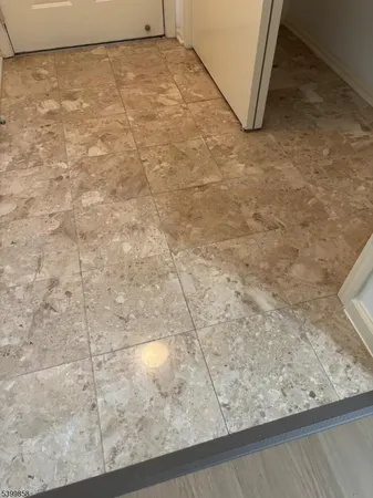 a view of a porch with a small yard