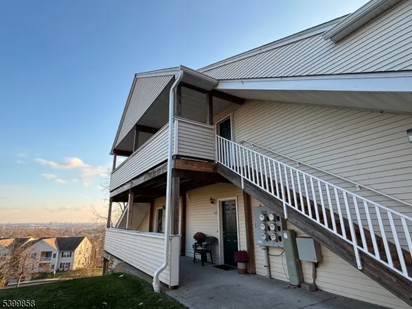 a view of house with staircase