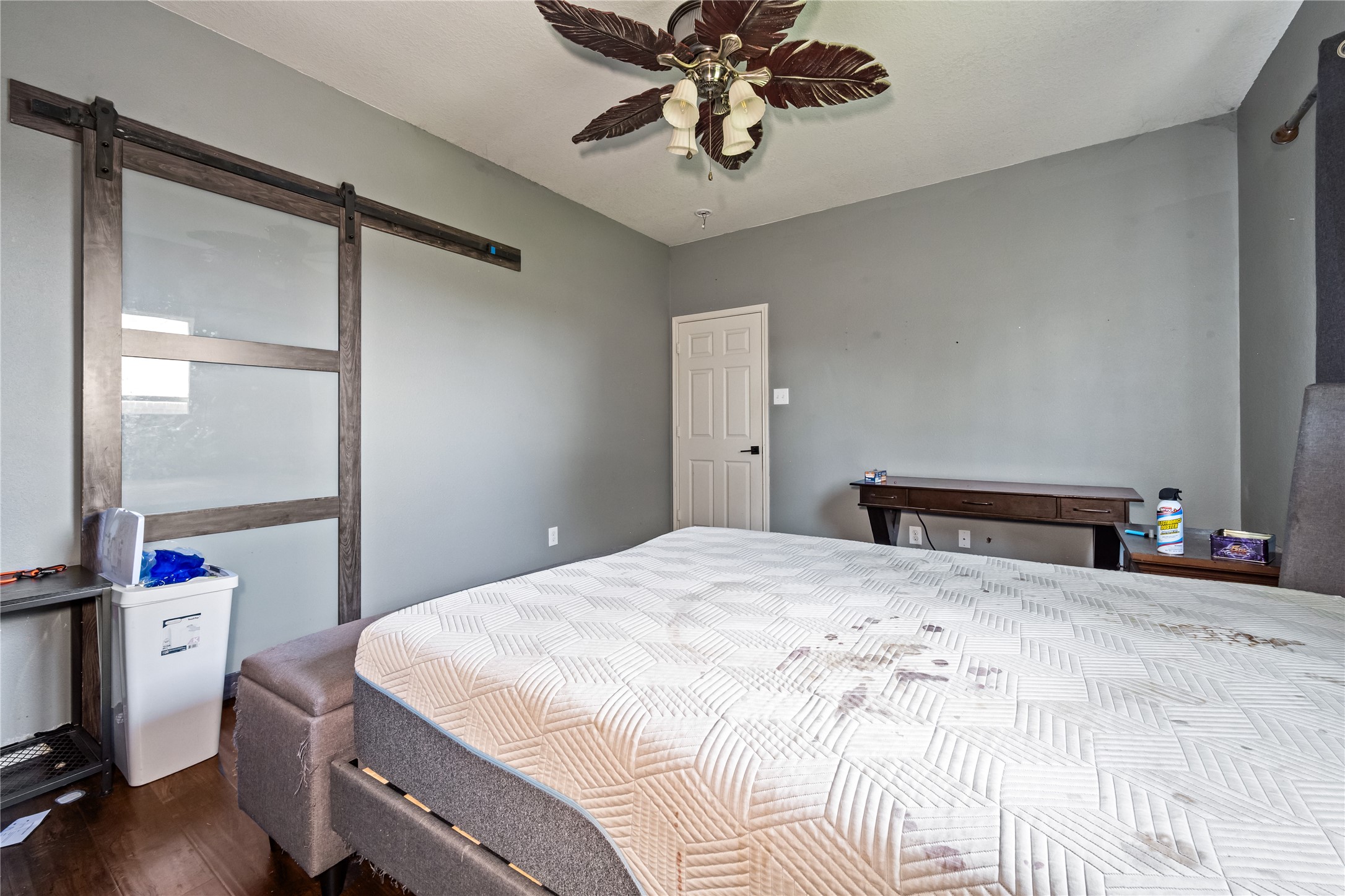 28832 San Bernard River Loop Spring, TX 77386 - Photo 20 of 50 a bedroom with a bed and a chandelier