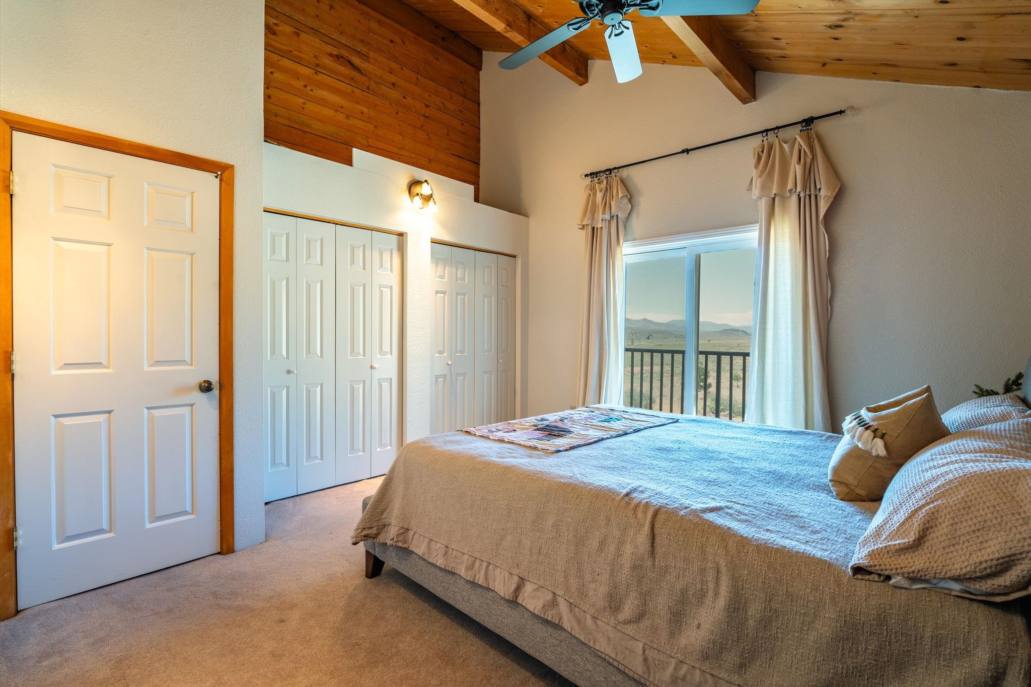 413-915 Scott Road Doyle, CA 96109 - Photo 17 of 28 a bedroom with a bed and a mirror