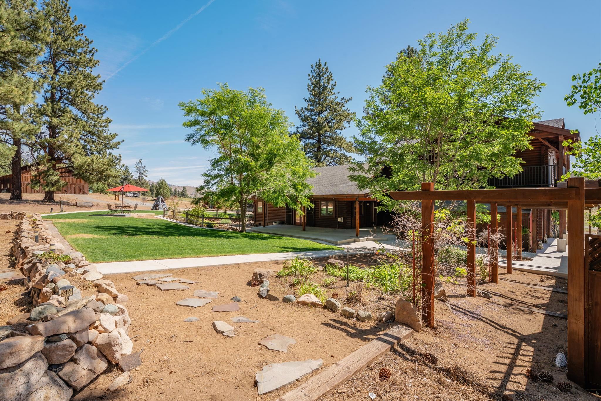 413-915 Scott Road Doyle, CA 96109 - Photo 5 of 28 a front view of a house with garden