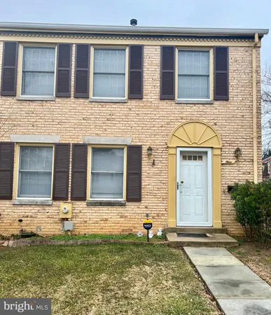 a front view of a house with garage